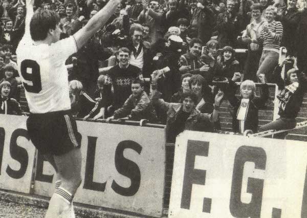 Bob Newton celebrates with fans