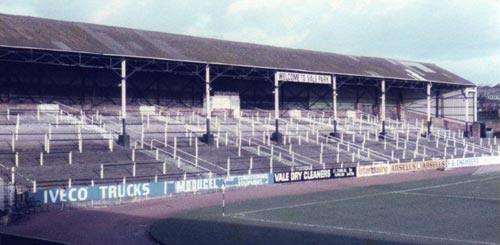 A second image showing the much-missed "Welcome to Vale Park" sign and a patched up corrugated iron roof