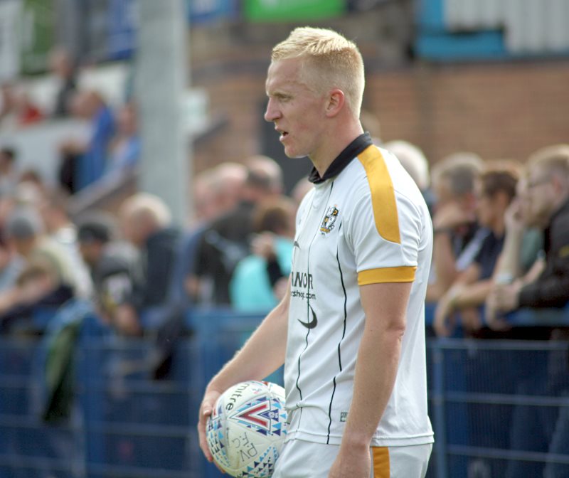 Mark Cullen in action against Leek Town - AS Photos