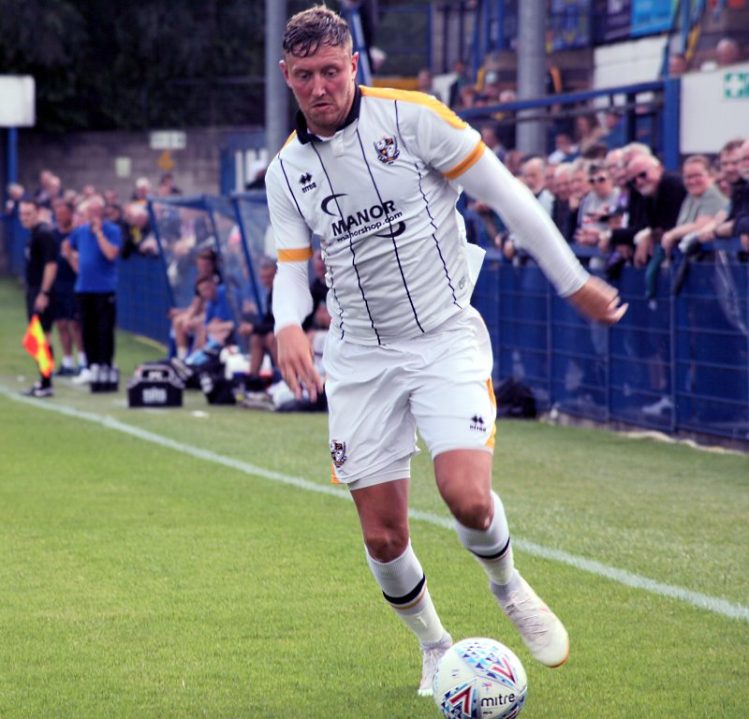 Richie Bennett in action for Port Vale at Leek - AS Photos