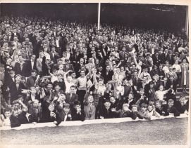 Fans in the Bycars stand