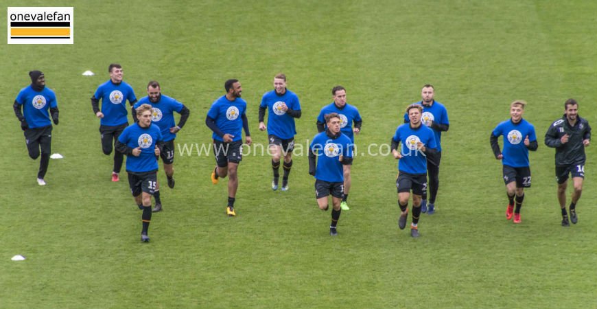 Paying respects: Port Vale players wear Leicester City themed shirts ahead of game