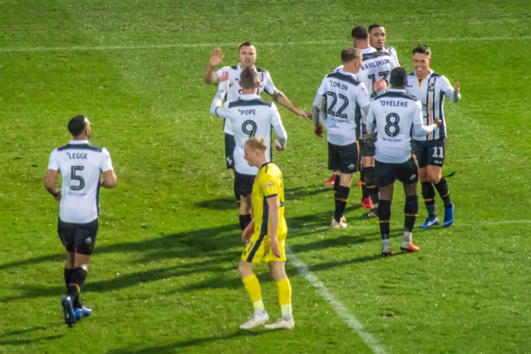 Vale players celebrate Montano's opener