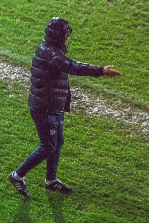 A drenched Neil Aspin barks orders