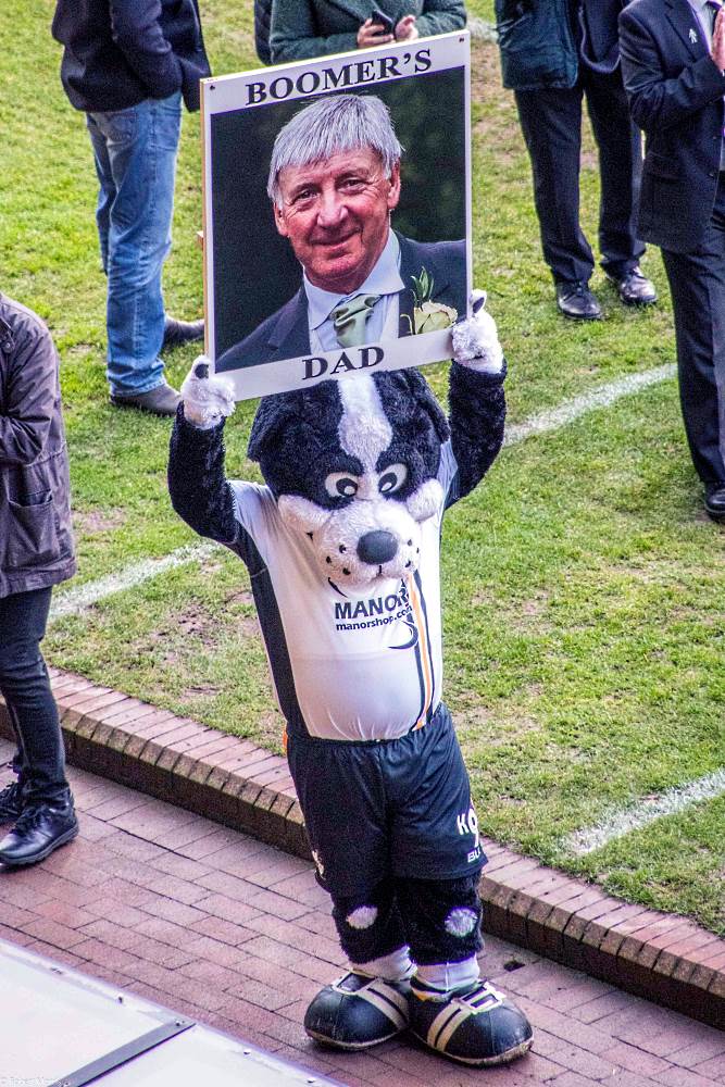 Boomer pays an emotional tribute to his late father during the game against Grimsby Town.