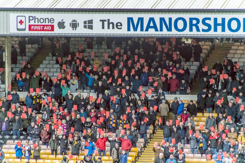 The red card protest during the game against Mansfield Town.