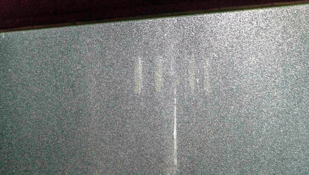 The heavy rain obscures the floodlight during the game with Cheltenham Town.