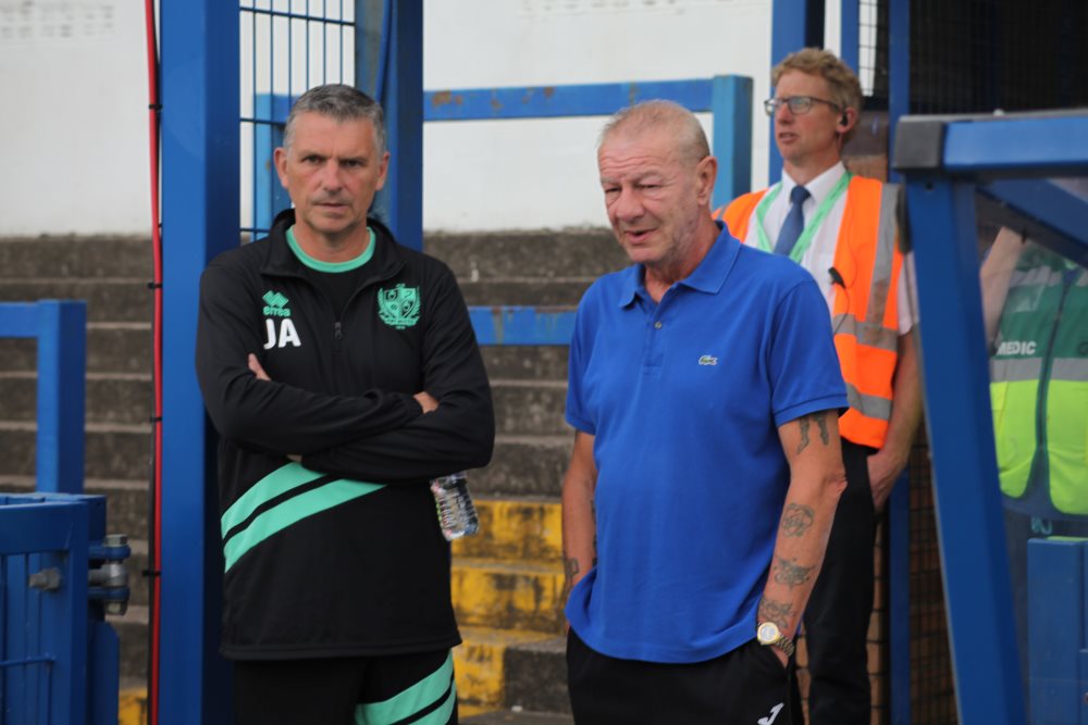 Managers John Askey and Leek's Neil Baker