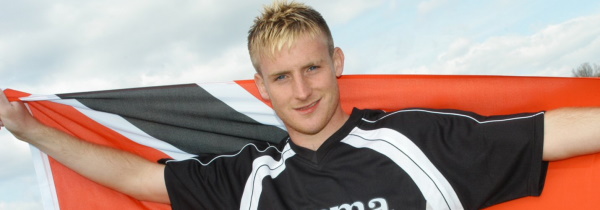 Chris Birchall with Trinidad and Tobago flag
