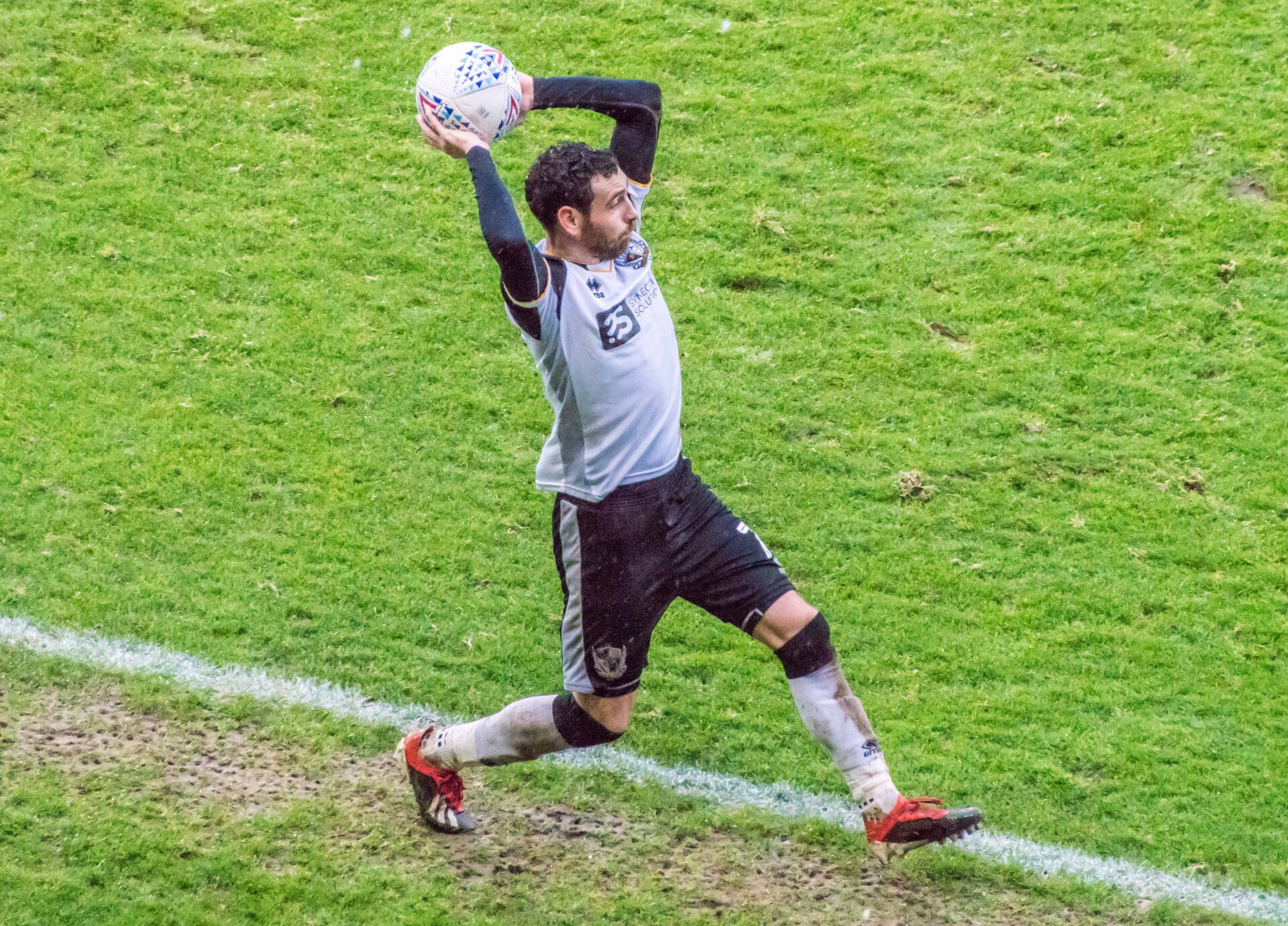 David Worrall takes a throw-in