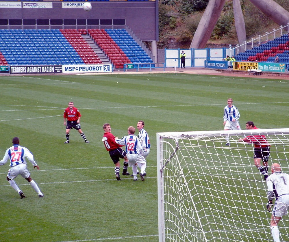 Port Vale play in a red kit at Huddersfield Town