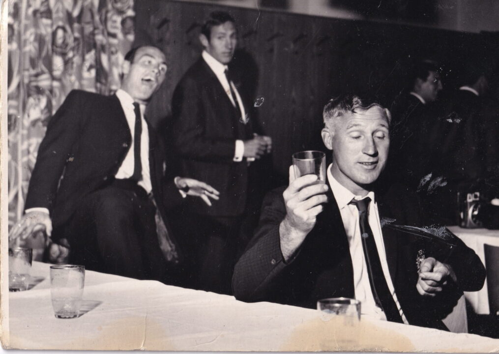 Celebrations after the first game featuring Ron Wilson, Roy Chapman and Len Graham.