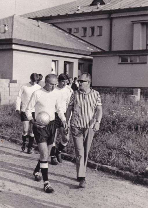Sir Stanley Matthews (with John James and Mick Cullerton in the background) leads the team out for the game against Skuter.
