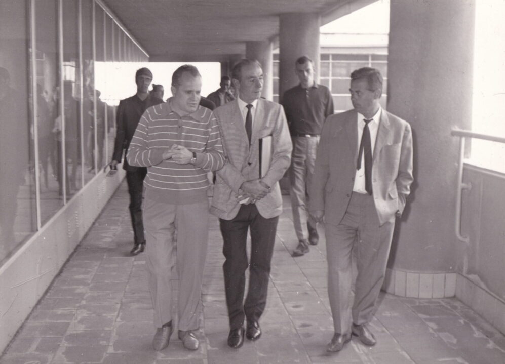 Sir Stanley Matthews with a press attaché and the MD of the Bata Shoes factory