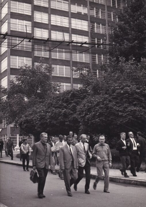The tour of the Bata shoe factory. Jimmy Hill, Mick Mahon and Roy Chapman can be seen in the background.