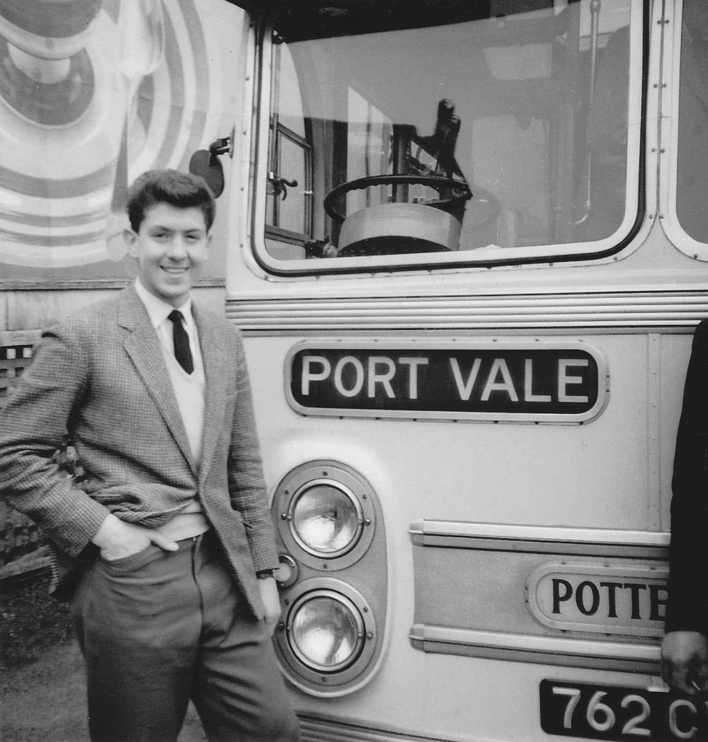 Port Vale goalkeeper Ken Hancock in front of the team coach