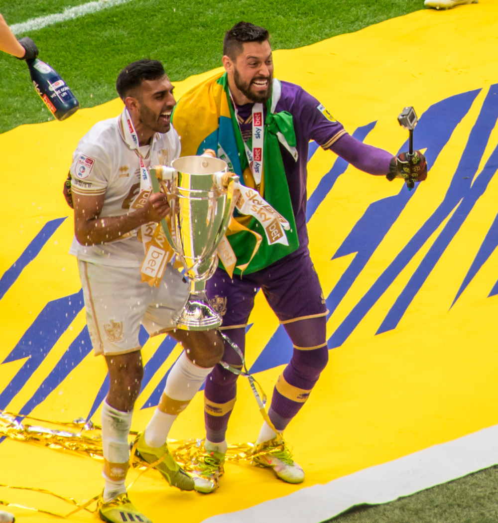 Mal Benning and Lucas Covolan celebrate promotion
