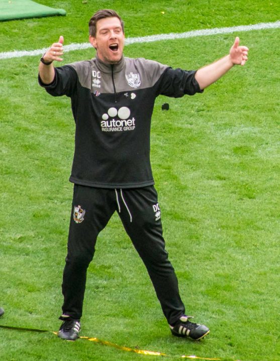 Port Vale manager Darrell Clarke celebrates promotion