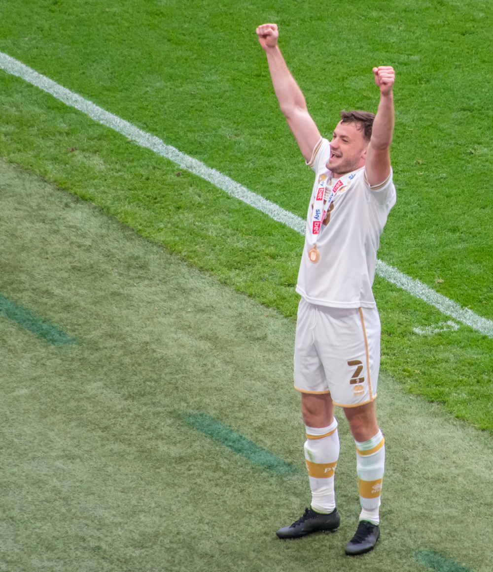 James Gibbons celebrates promotion in 2022