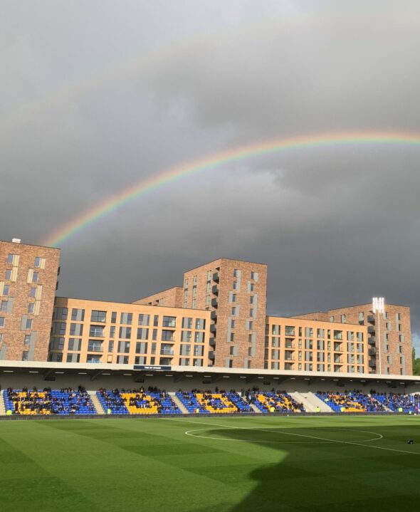 Plough Lane - AFC Wimbledon - Johnlp, CC BY-SA 4.0 <https://creativecommons.org/licenses/by-sa/4.0>, via Wikimedia Commons