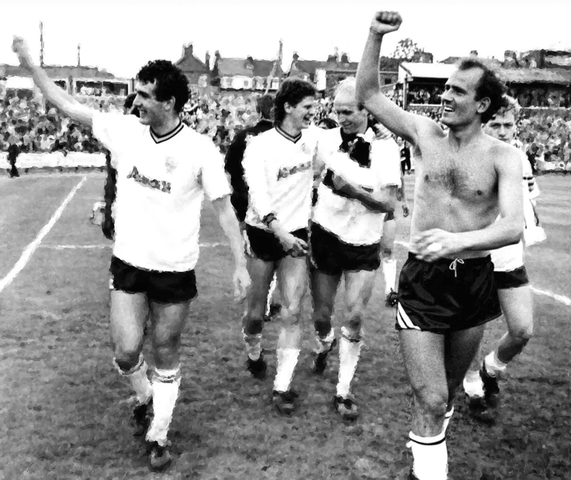 Simon Mills (right) celebrates promotion